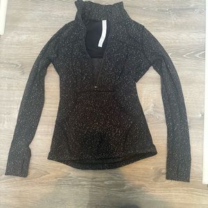 Speckled black and white lululemon half zip jacket. Great condition